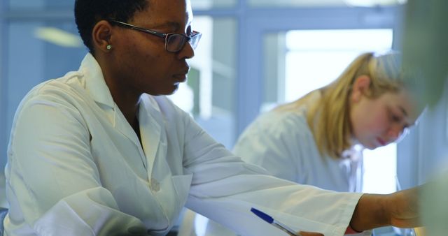 Focused Scientists Working in Laboratory Environment - Download Free Stock Images Pikwizard.com