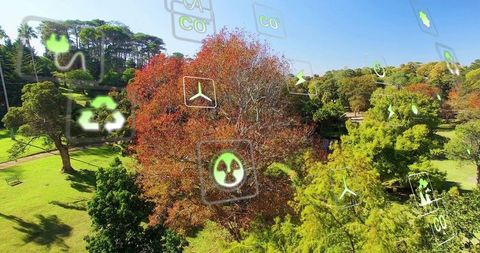 Sustainable Environment Icons Over Green Urban Park