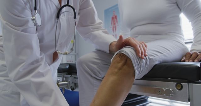 Female Physiotherapist Treating Ankle of Patient in Therapy Room - Download Free Stock Images Pikwizard.com