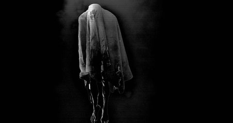 Ethereal Ghostly Figure with Billowing Smoke