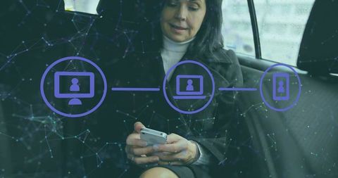 Businesswoman holding smartphone in car backseat with connected device icons for mobile work