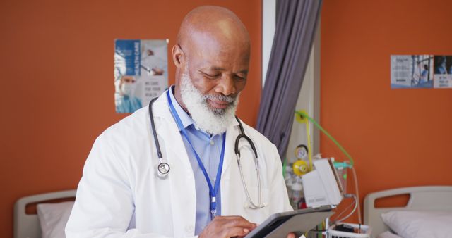 Senior Doctor Using Digital Tablet in Hospital - Download Free Stock Images Pikwizard.com