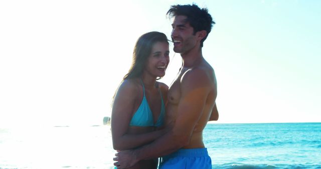 Couple romancing at beach on a sunny day 4k