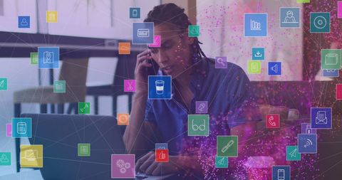 Businessman engaging with digital network of icons
