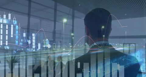 Businessman analyzing data with cityscape in background