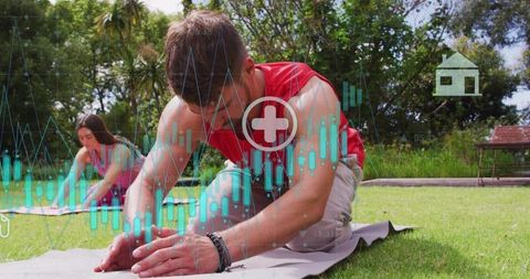 Couple stretching on yoga mats in park with fitness data overlay and wellness metrics