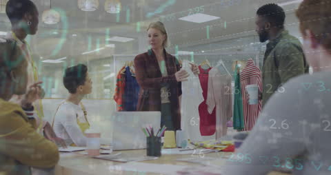 Team Collaborating in Fashion Startup with Financial Data Overlay