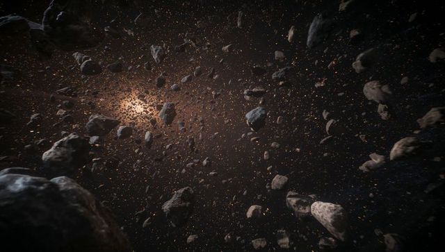 Dense asteroid field drifting through deep space, glowing particles and backlit boulders