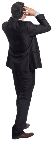Stressed businessman in suit holding head, transparent background