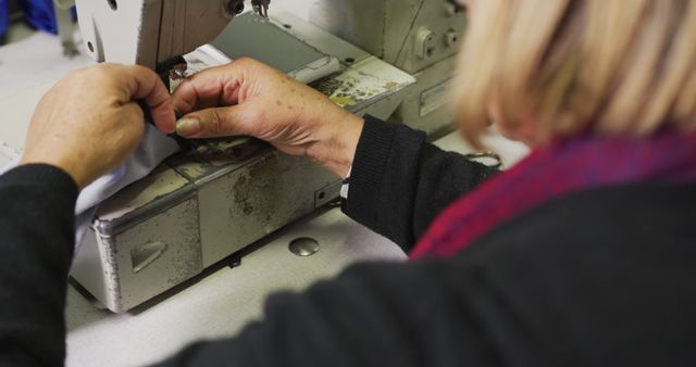 Person Sewing Fabric with Industrial Sewing Machine in Workshop - Download Free Stock Images Pikwizard.com