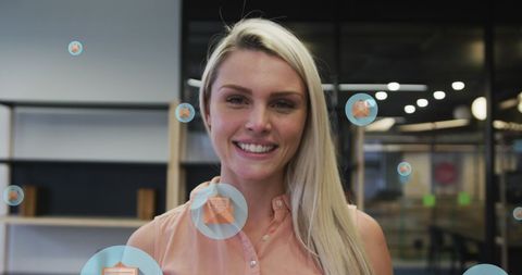 Businesswoman embracing digital communication in modern office