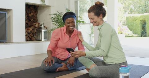 Diverse Friends Sharing Fitness Journey on Yoga Mats at Home