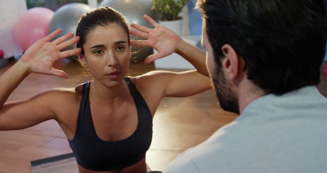 Woman Exercising with Trainer in Fitness Studio - Download Free Stock Images Pikwizard.com