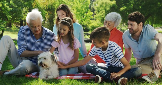 Multigenerational Family Enjoying Outdoor Picnic with Pet Dog - Download Free Stock Images Pikwizard.com