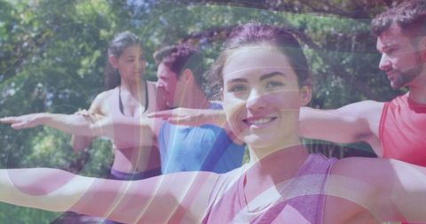 Group Yoga Session Outdoors with Diverse Friends