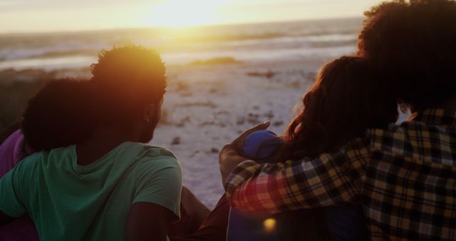 Friends Watching Sunset at Beach in Close Embrace - Download Free Stock Images Pikwizard.com