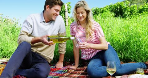 Couple Enjoying Wine Outdoors in Sunny Vineyard Paradis - Download Free Stock Images Pikwizard.com