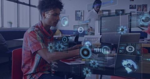 Young developer working at coworking space with holographic ar dashboards and data visualization