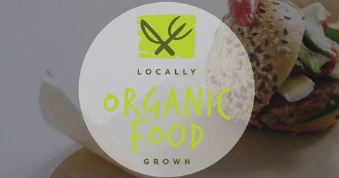 Organic food label over seeded sandwich flatlay featuring locally grown deli branding