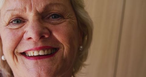 Senior Woman Smiling with Joyful Expression at Home