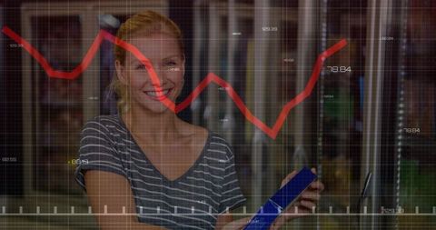Smiling woman holding product in supermarket with retail analytics overlay and sales graph