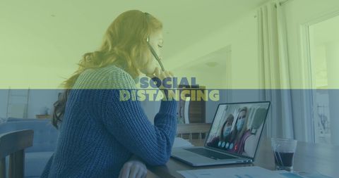 Woman Engaged in Video Call Practicing Social Distancing