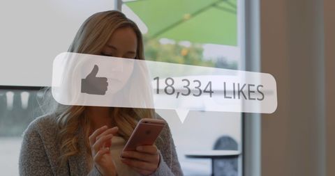 Businesswoman Checking Social Media with Virtual Likes Overlay - Download Free Stock Images Pikwizard.com