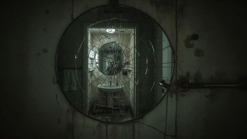 Atmospheric Abandoned Corridor Reflected in Cracked Mirror