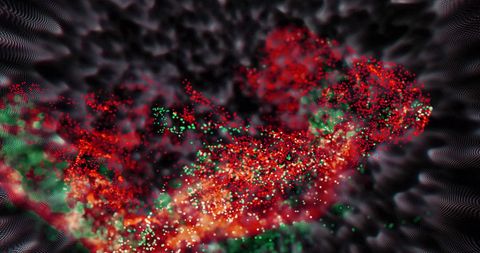 Abstract Red and Green Particle Burst on Dark Background