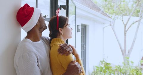 Affectionate Couple Enjoying Holiday with Cozy Embrace