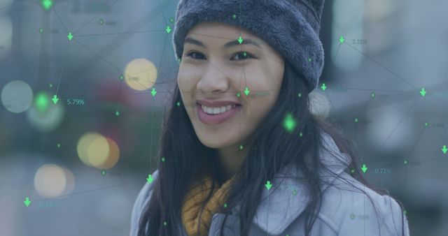 Smiling Young Woman in Winter Clothes with Digital Data Overlays - Download Free Stock Images Pikwizard.com