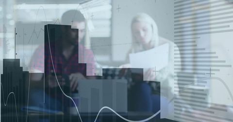 Business team analyzing financial data in enterprise office