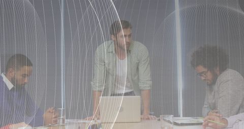 Futuristic Business Meeting with Digital Interface Overlay