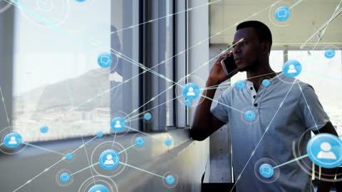 Man Engaging with Technology Illustrating Networking Connections