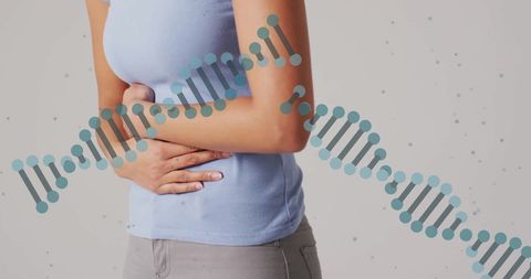 Genetics and digestive health: person experiencing stomach pain