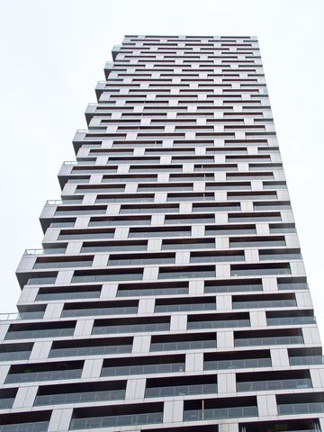 Modern high-rise building with unique geometric design