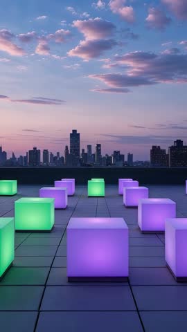 Vertical rooftop LED cubes glowing purple and green over city skyline at twilight
