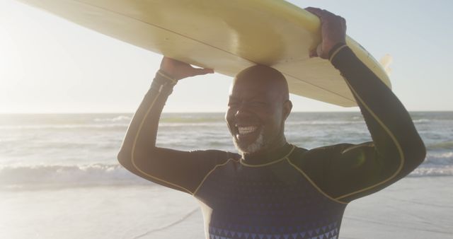 Senior Surfer Holding Board on Sunny Beach - Download Free Stock Images Pikwizard.com