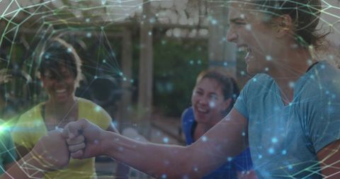 Diverse Women Celebrating at Obstacle Course with Digital Overlay