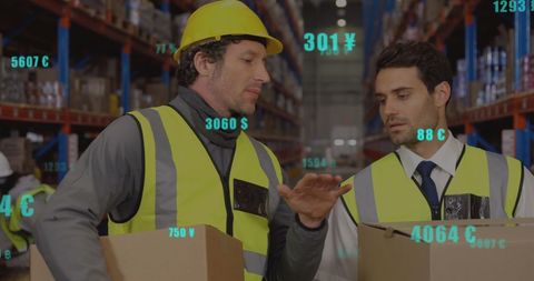 workers analyzing financial data overlay in warehouse setting - Download Free Stock Images Pikwizard.com