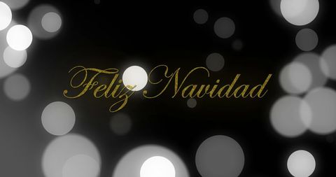 Feliz Navidad Greeting with Festive Bokeh Lights