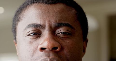 Pensive man gazing intently with natural light