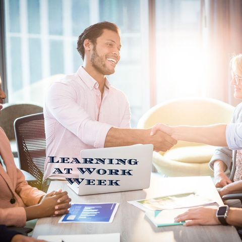 business team celebrating learning at work week with a handshake - Download Free Stock Templates Pikwizard.com