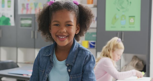 Smiling Schoolgirl in Colorful Classroom Setting - Download Free Stock Images Pikwizard.com