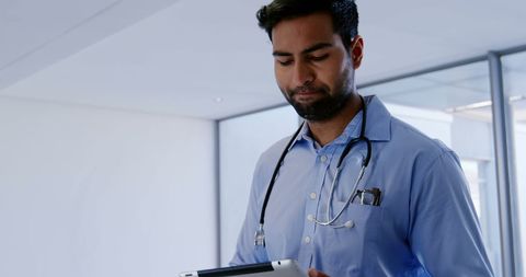 Male Doctor with Digital Tablet in Modern Hospital - Download Free Stock Images Pikwizard.com