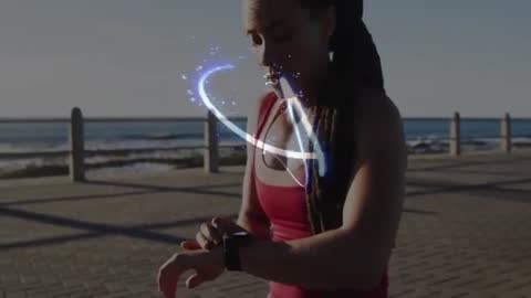 Athlete Using Smartwatch With Futuristic Visual Effects Outdoors