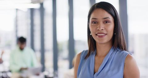 Confident Businesswoman Standing in Professional Office Setting