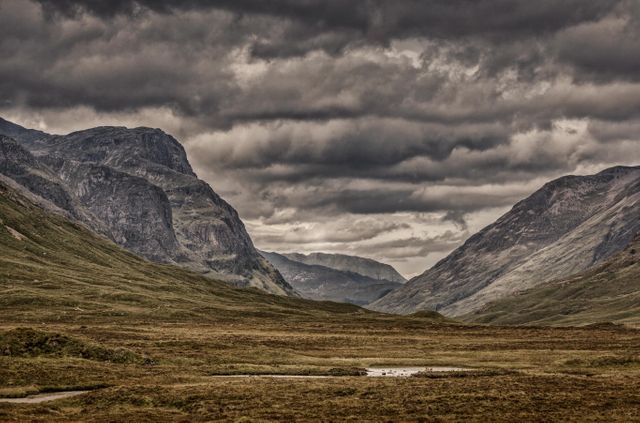Dramatic Mountain Landscape Under Stormy Skies - Download Free Stock Photos Pikwizard.com