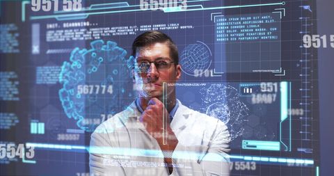 Caucasian Doctor Analyzing COVID-19 Data and Digital Interface - Download Free Stock Images Pikwizard.com