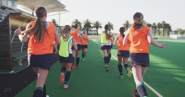 Young Female Hockey Players Practicing on Field - Download Free Stock Images Pikwizard.com